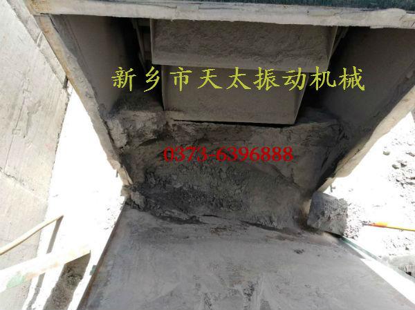 NE板鏈斗式提升機機座積料跑灰現(xiàn)場改造方法